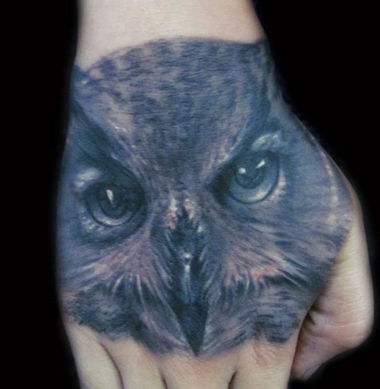 owl tattoo on hand