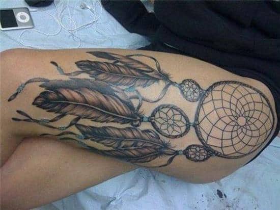 dreamcatcher on upper leg tattoo design