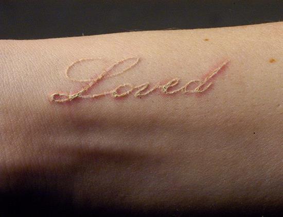 13-White-ink-loved-tattoo