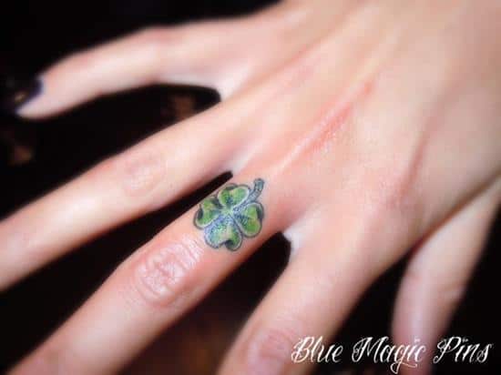 22-Little-Clover-Finger-Tattoo