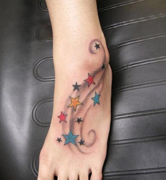 22-stars-tattoo-on-foot-with-swirl600_650