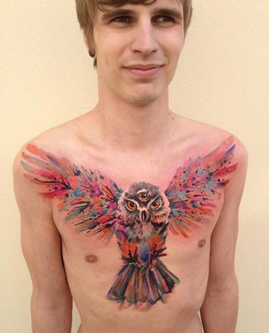 Watercolor owl chest tattoo