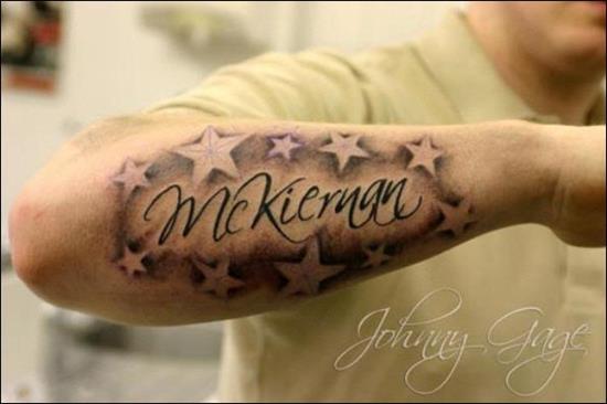 23-name-with-shaded-stars-tattoo-on-forearm_596_397