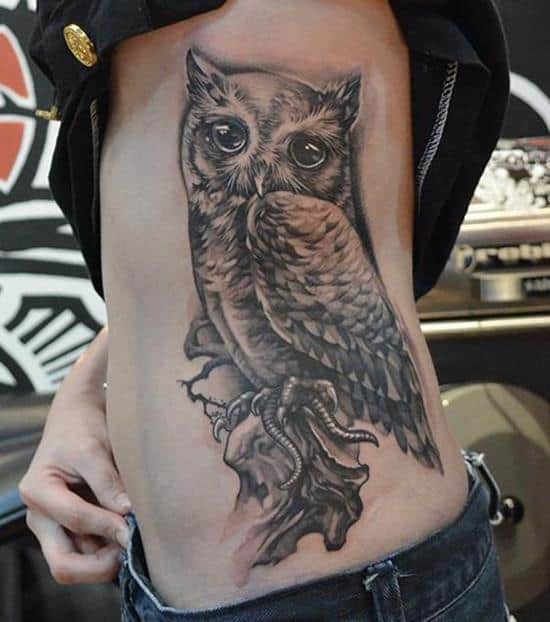 owl tattoo on side