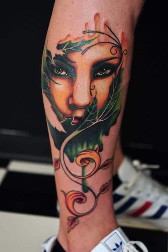 24-woman-in-leaves-leg-tattoo