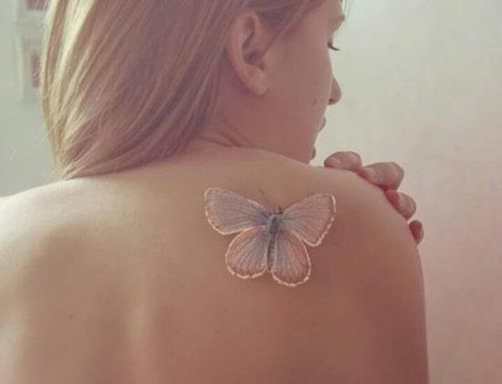 29-White-ink-butterfly-tattoo-on-back