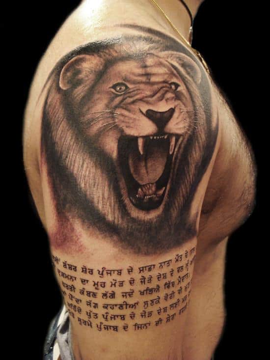 34-Lion-whit-punjabi-writing-tattoo