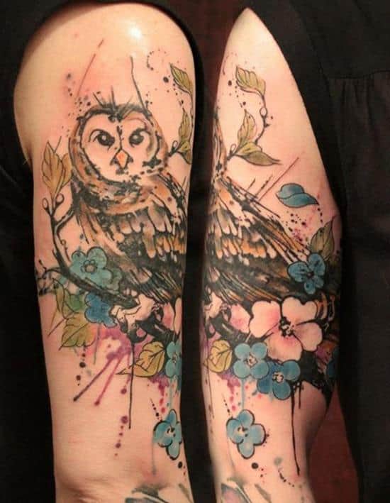 watercolor owl arm tattoo