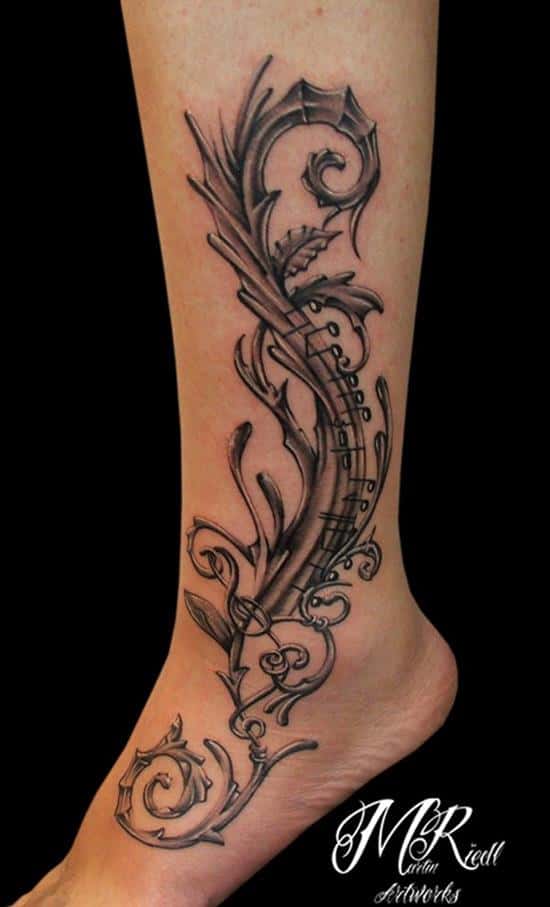 38-Dynamictattoo-Notes-leg-tattoo