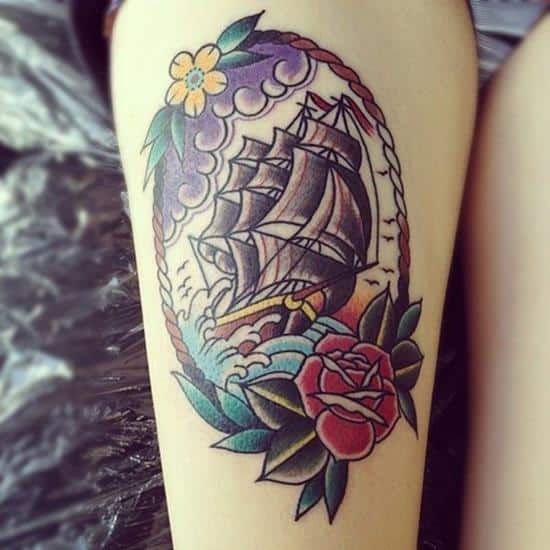 ship and flower tattoo on leg 42-Traditional-ship-on-leg