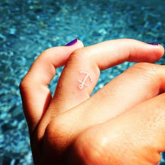 44-White-ink-anchor-finger-tattoo