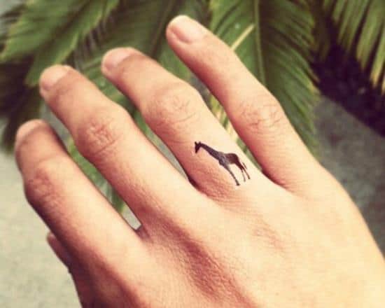 53-Giraffe-tattoo-on-finger