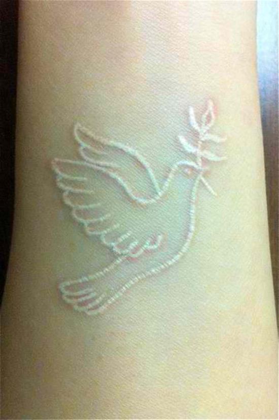 55-White-Ink-Bird-Tattoo