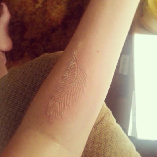58-White-Ink-Feather-Tattoo-600x600
