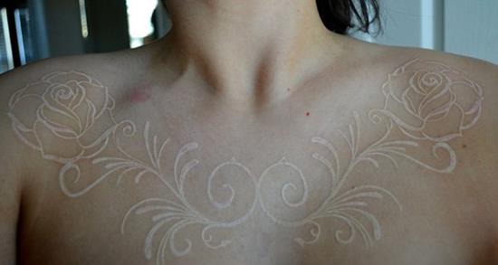 6-White-Ink-Flower-Tattoo-on-Chest