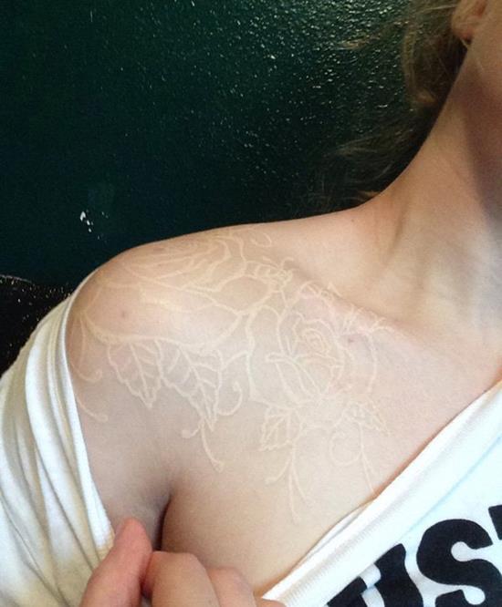 60-White-Ink-Flower-Tattoo-on-Shoulder