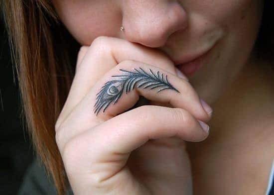 9-Peacock-finger-tattoo