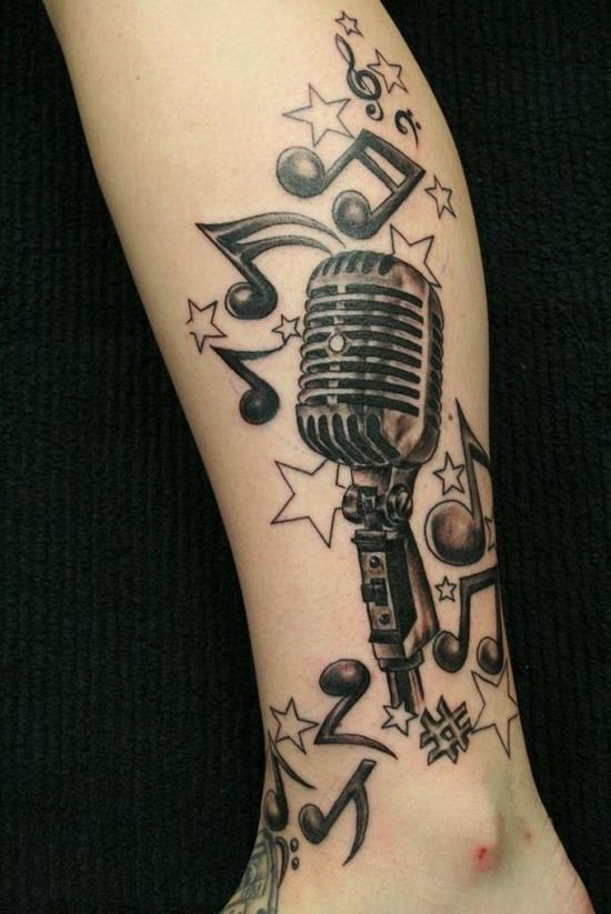 microphone and musical notes tattoo on leg 9-tattoo-design-of-mic-notes-tattoo-on-leg