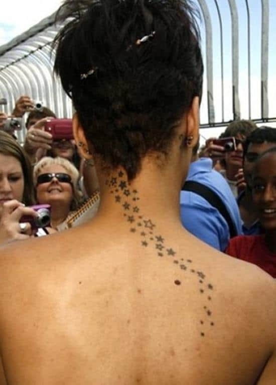 Awesome-star-tattoos-designs-for-girls-on-back-Rihanna-Tattoo