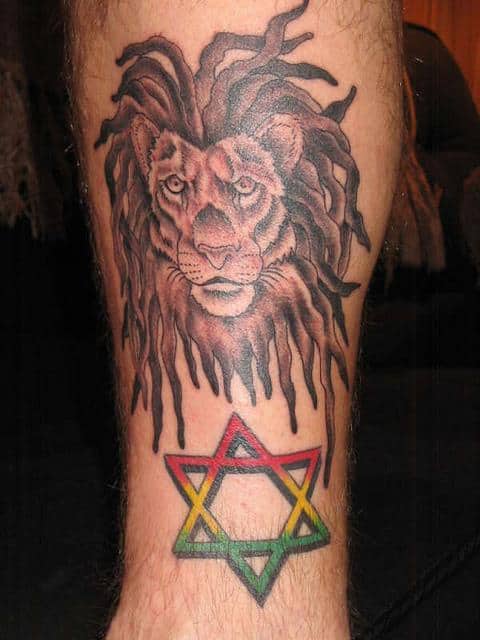 Lion-and-Star-Leg-Tattoo-Design-For-Men