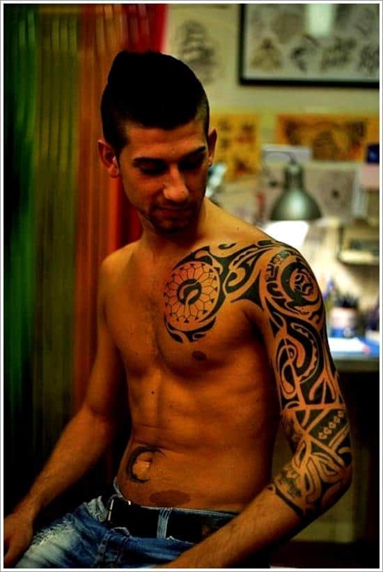 man with maori arm tattoo