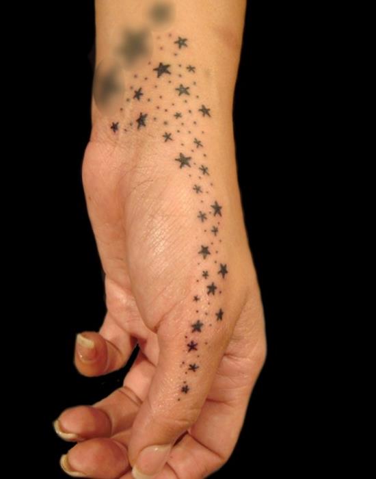star tattoo on hand