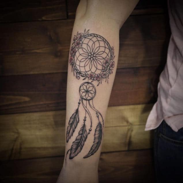 dreamcatcher tattoo on inner arm