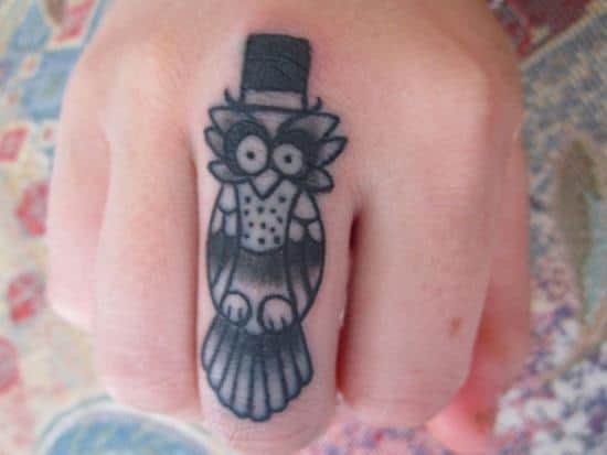 middle finger owl tattoo