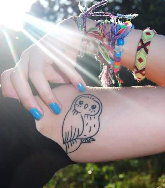 cartoon small owl tattoo