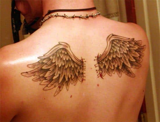 small-angel-wing-tattoo-on-the-upper-back