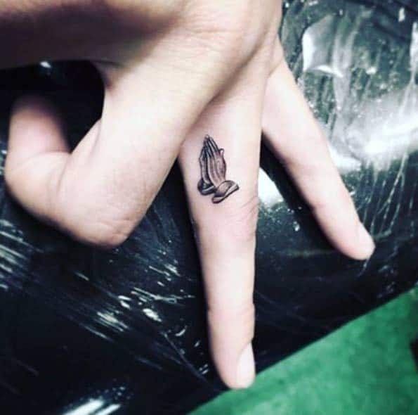 Christian Finger Tattoo by Isaiah Negrete