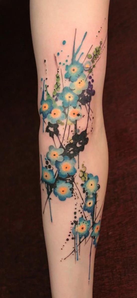 16-Tiny-Blue-Flowers-arm-tattoo