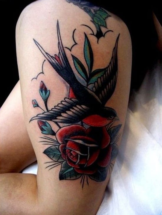 25-swallow-and-rose-thigh-tattoo