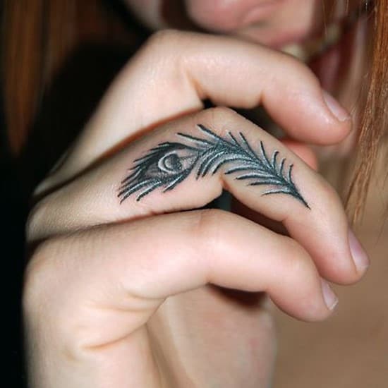 28-Peacock-Feather-on-Finger-Tattoo
