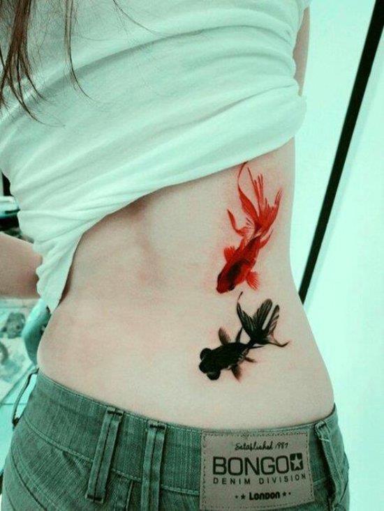 orange and black koi fish tattoo on back 34-fish-tattoo