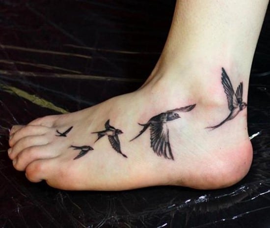 35-Foot-Realistic-Swallow-Tattoo