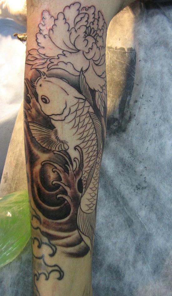 koi fish with waves tattoo on leg 41-fish-tattoo