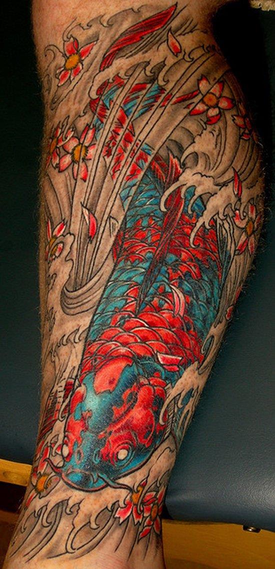 red and blue koi fish tattoo on leg 42-fish-tattoo