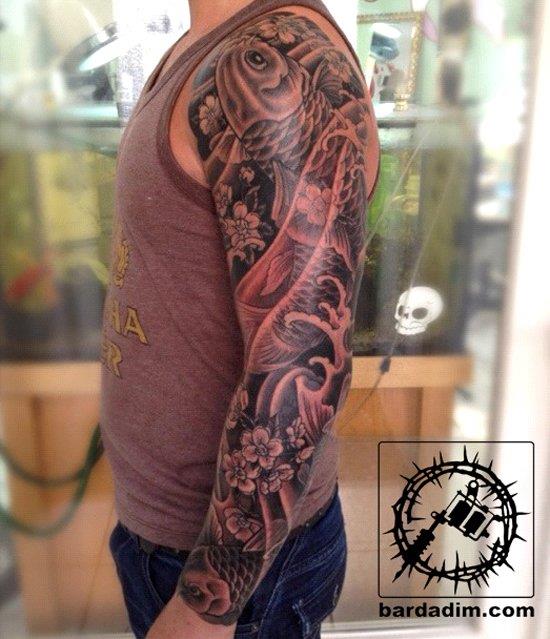 black koi fish tattoo on arm 50-fish-tattoo
