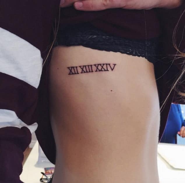Roman Numeral Tattoo by Lory Labossiere