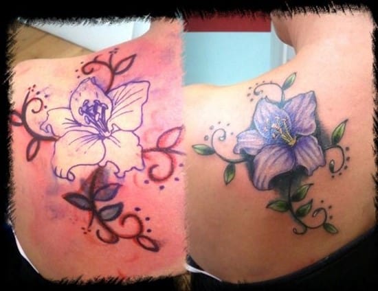 Realistic purple calla lily tattoo on the left upper