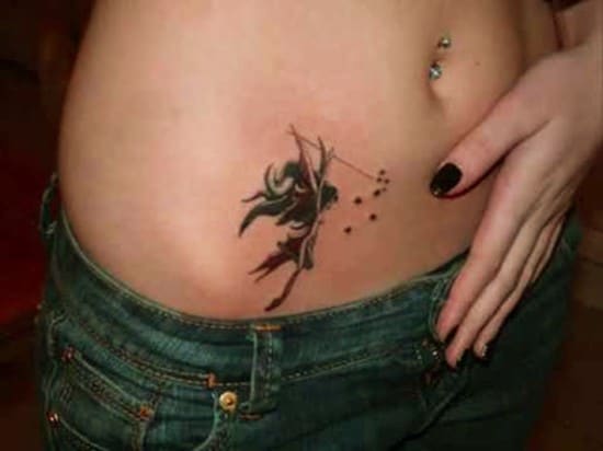 Artistic-fairy-stomach-tattoo