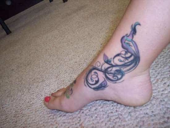 swirl tattoo on ankle Awesome-Peacock-Ankle-Tattoo