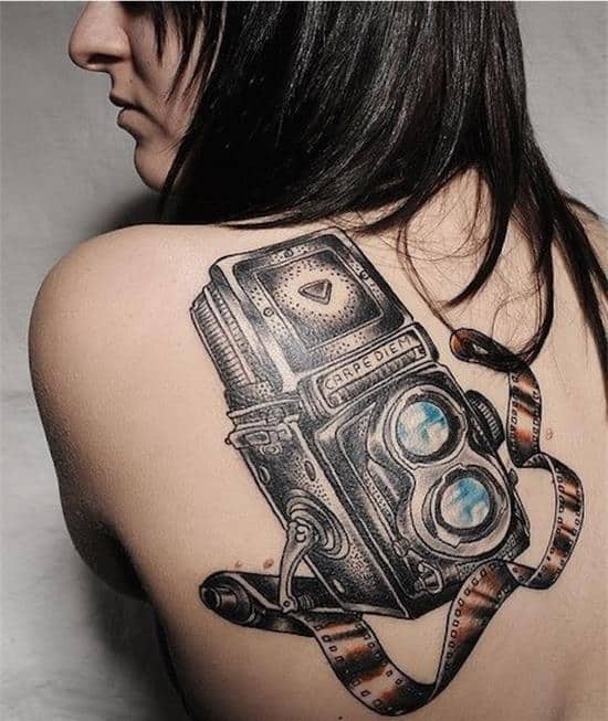 carpe diem tattoo design on woman's back