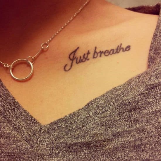 Collar-bone-script-tattoo-for-women