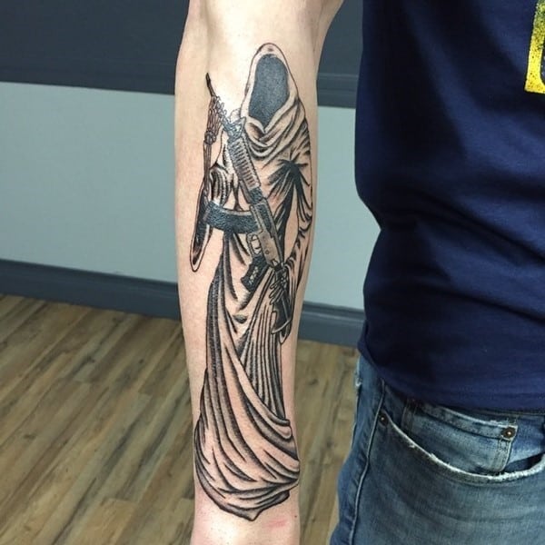 grim reaper with a gun tattoo