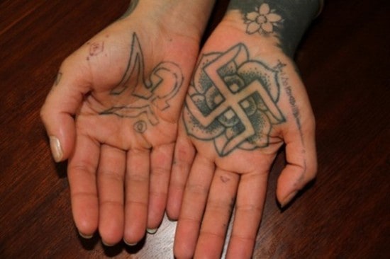 lotus flower tattoo on palm Tattoos-of-Ancient-Buddhist-Symbols