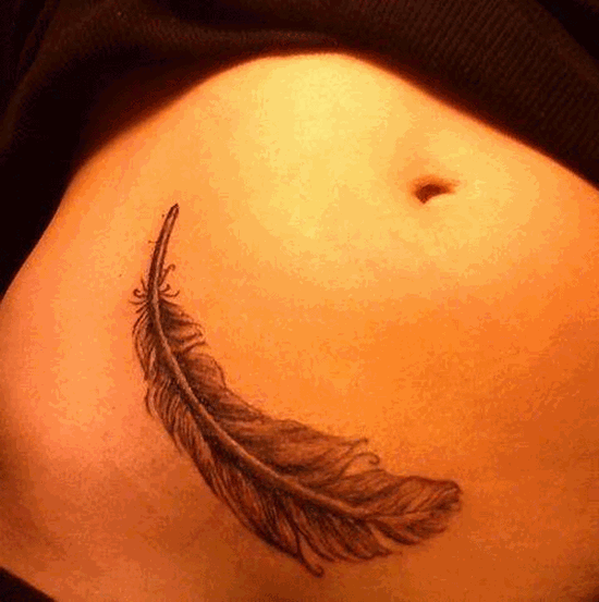 Wonderful-feather-stomach-tattoo