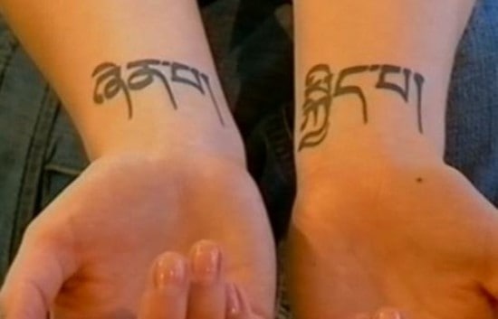 buddhist symbols tattoo on wrist buddhist-tattoo-on-wrist