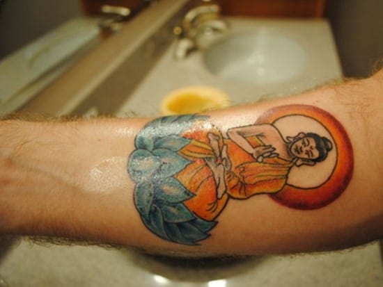 sitting buddha tattoo on arm buddhist-tattoos-below-the-waist